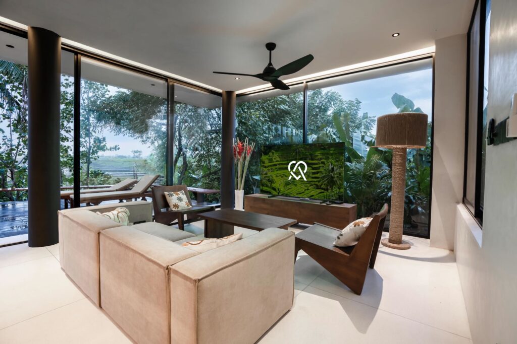 Indoor living space opening to pool at Villa Amore luxury villa Bereban Bali