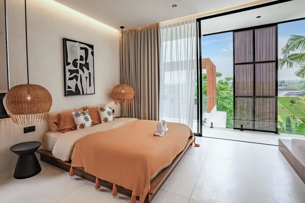 Second bedroom at Villa Amore Bereban Bali with natural light and terrace access