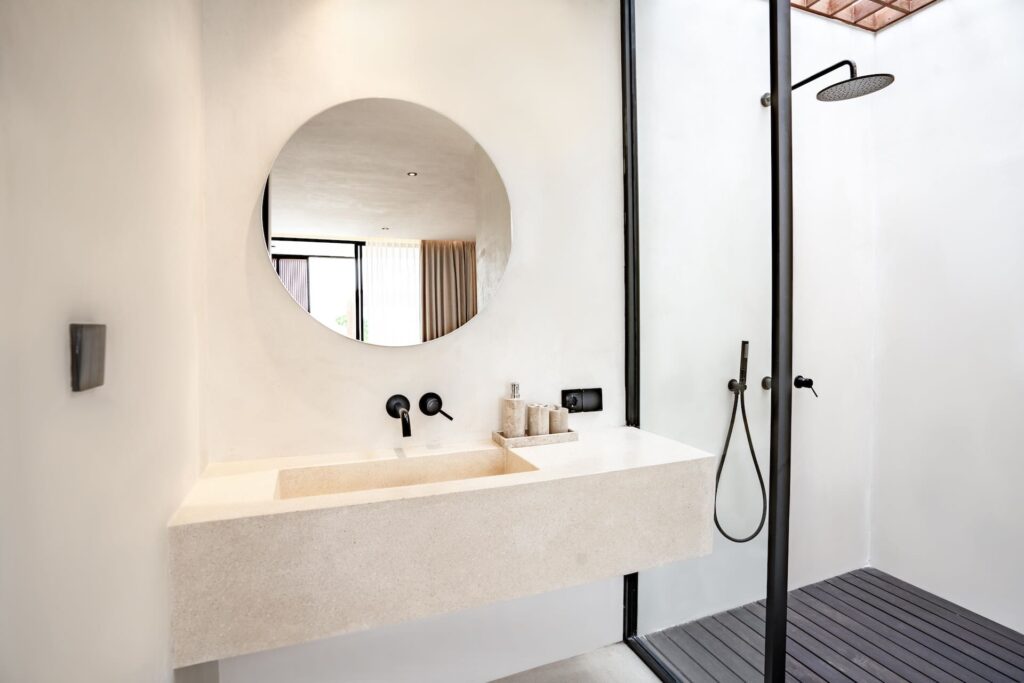 Minimalist bathroom design at Villa Amore Bereban Bali with stone finishes